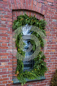 View of a window in Helsinki with a Christmas tree decoration