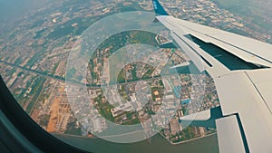 View from the Window of a Jet Plane on the Bangkok City Landscape