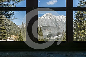 View through the window of the mountain hut to the top - Kominiarski Wierch.