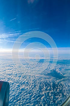 The view from the window of the plane on the wing