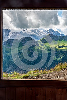 View through window of shelter on Col di Lana in the Dolomites photo