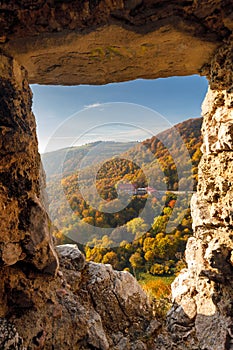 View through the window in the stone wall