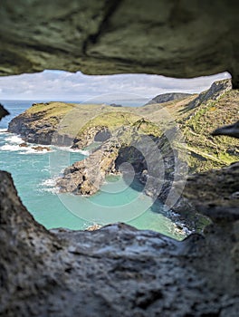 The view from a window at Tintagel Castle in Cornwall, England, from the mainland.