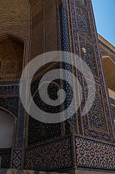 View through the window to the ancient madrasah, Bukhara, Uzbekistan