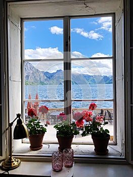 View through window to lake Traunsee, Gmunden - Austria