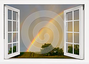 View from the window to the sky with a rainbow