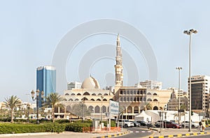 View from the window of the tourist bus to the King Faisal Mosque in Sharjah city, United Arab Emirates