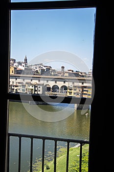 View from the window of Uffizi Gallery to the Ponte Vecchio, aka Old Bridge of Florence, Italy