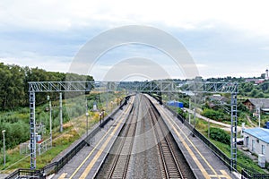 A view from a window of View from the railway bridge to the empty railwaya moving train shot on a wide-angle lens