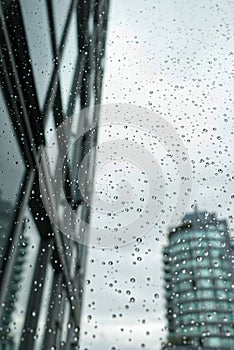 View from the window with water drops on it at rainy Day