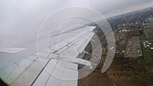 View from the window on the wing of a passenger aircraft during takeoff