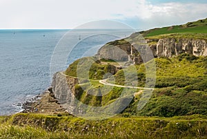 View of Winspit Quarry from the cliff top coastal walk, near Worth Matravers, Dorset, Engand, UK photo