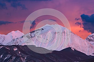 View of winter fiery sunset over Monte Corvo in the Gran Sasso e Monti della Laga National Park Abruzzo