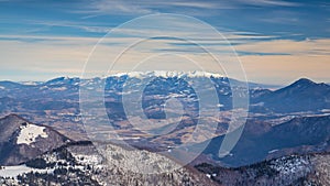 View of the winter landscape with snowy mountains of Western Tat