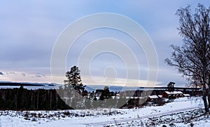 View of winter landscape during sunset from the village of TÃ¤llberg, Dalarna, Sweden