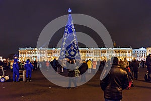View of Winter Palace and Christmas Tree on Palace square at night. Saint Petersburg. Russia