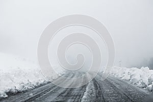 View on winter road during bad weather conditions
