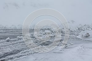 View on winter road during bad weather conditions