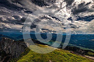 View on Wolfgang see from top of Schafberg on a sunny day with dramatic cloudy blue sky