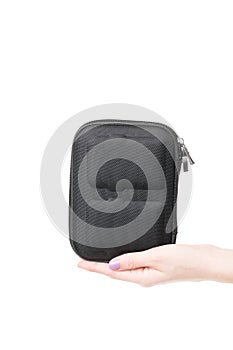 View on the woman palm holding black case for batteries for quadcopter
