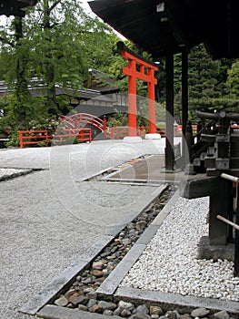 View of a wonderful red torii gate at a shinto shrine in japan photo