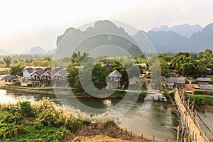 View of wooden bridge over river song, Vang vieng, Laos.