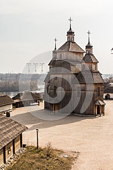 View of the wooden church in the National Reserve `Zaporizhzhia Sich` on the island of Khortytsia in Zaporizhzhia. Ukraine photo