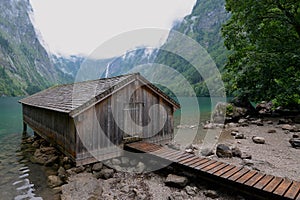 View of the wooden hut and pier at Obersee, Berchtesgadener, Germany.