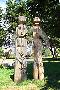 Wooden Mapuche indigenous people of Patagonia statues in Bariloche, Argentina. photo