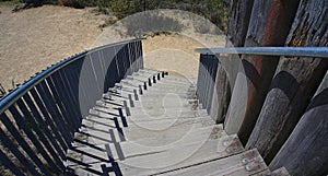 View of wooden stairs going down