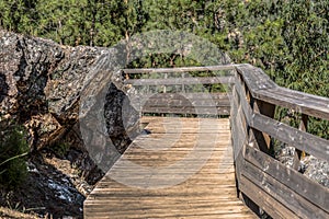 View of wooden suspended pedestrian walkway, overlooking the Paiva river photo