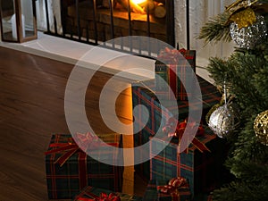 View of wrapped gifts and fireplace