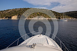 View from the yacht on the rocky coast of the KASTOS island, Lefkada Regional unit, Ionian Islands, Greece.