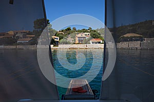 View from the yacht to the coast of KASTOS island, Ionian Islands, Greece in summer.