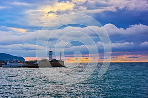 View of the Yalta. view of the lighthouse at dawn.