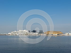 View of Yas Bay Waterfront with Etihad Arena, Formula One track and TwoFour 54 Building in Abu Dhabi