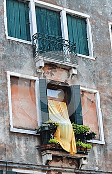 View of yellow curtains on residential building in Venice