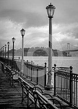 A view of Yerba Buena Island the San Francisco Bay Bridge From Pier 7 in Black and White