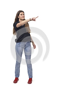 view of a young girl pointing on white background