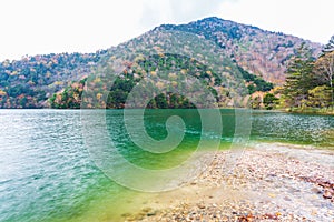 View of Yuno Lake in autumn season at Nikko national park, Nikko, Japan.