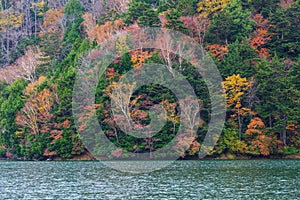 View of Yuno Lake in autumn season at Nikko national park, Nikko, Japan.