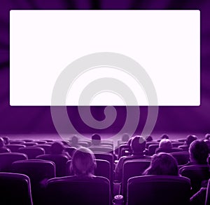 Viewers at movie theater, violet toning