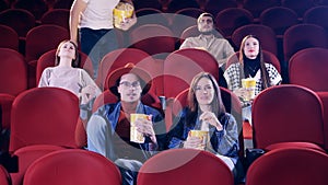 Viewers taking their seats in the cinema
