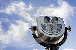 Viewing binoculars with blue sky