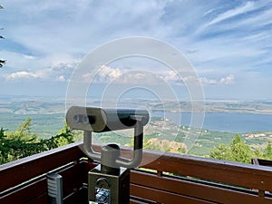 Viewing telescope monocular overlooking Lakes and mountains in South Ural, Russia