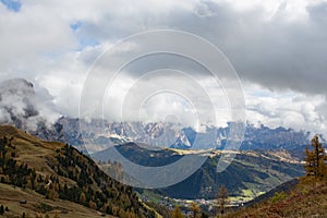 Viewing to the Conturines and Monte Cavallo from Passo Sella. A beautiful Fall Day in the Dolomites looking over a scenic view and