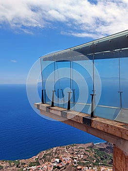 Viewing walkway suspended over the sea with a view of the Teide Volcano. Abrante viewpoint on the island of La Gomera.