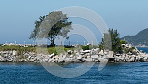 Viewpoint in Cabo Frio, with beautiful rock formations, boats and blue sky