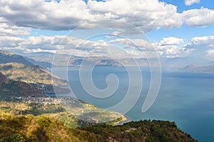 Viewpoint at lake Atitlan - view to the small villages San Marcos, Panajachel and San Marcos at the lake in the highlands of