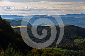 Viewpoint on a landscape of mount Bobija, hills, meadows and colorful forests